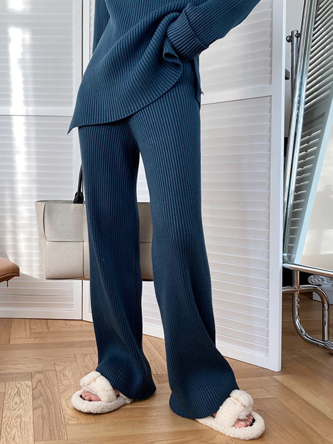 French Blue ribbed knit co-ord set with asymmetric top and wide leg pants.