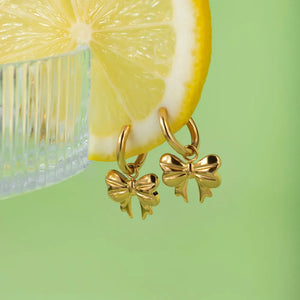 Gold hoop earrings with bow charms, 18K gold-plated, casual style