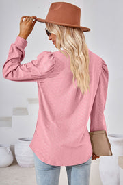 Blush pink textured puff sleeve henley blouse with a diamond pattern