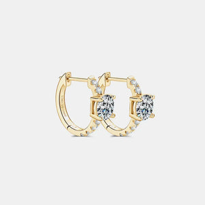 Gold pavé-set moissanite huggie hoop earrings with a central square-cut stone.