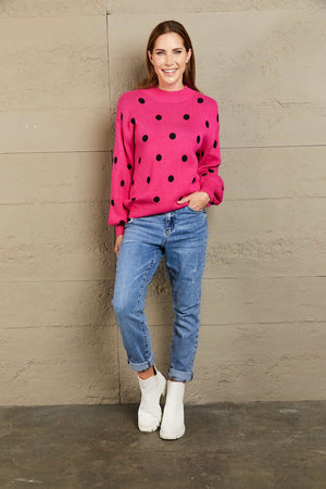 Hot Pink polka dot knit sweater with balloon sleeves and crew neck.