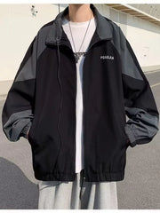Plus-size black and grey two-tone windbreaker jacket with zip front and text detail.