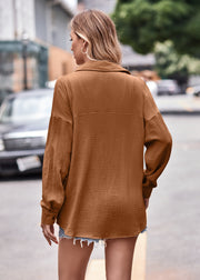 Textured gauze overshirt in caramel with relaxed silhouette and button cuff sleeves.