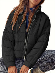 Black quilted bomber jacket with stand collar and silver zipper detail