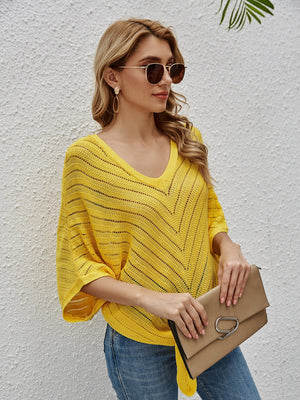 Yellow chevron knit tie-front cover-up with batwing sleeves and V-neck.