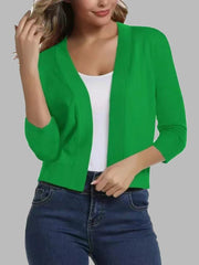 Green cropped elbow-sleeve open-front knit cardigan with a V-neckline.