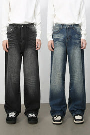 Oversized wide-leg jeans in dark wash and medium wash denim with distressed details.