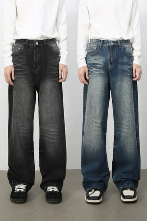 Oversized wide-leg jeans in dark wash and medium wash denim with distressed details.
