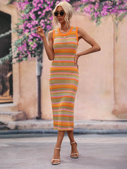 Striped knit sleeveless midi dress in orange and pink with a crochet texture.