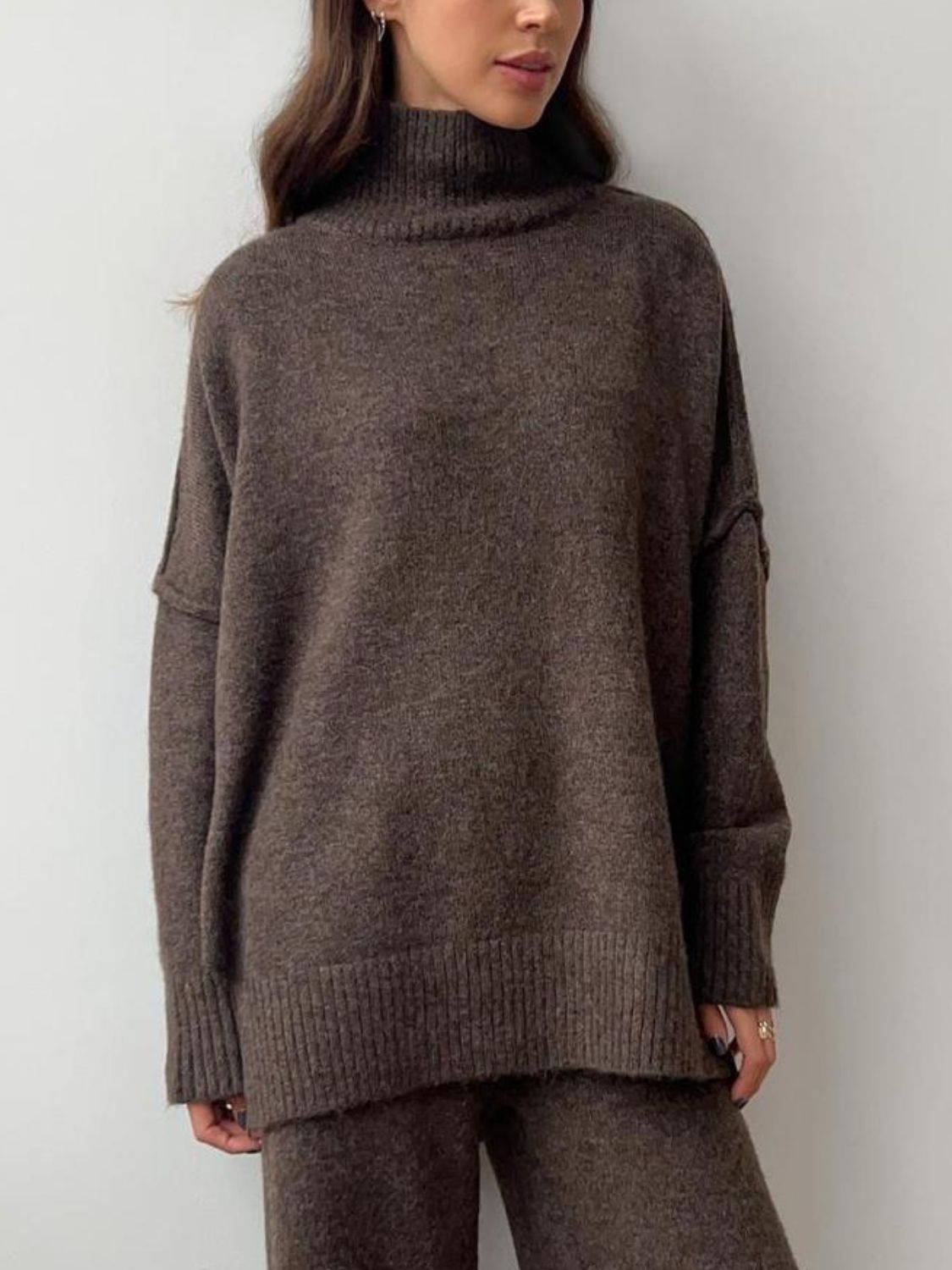 Oversized turtleneck lounge knit set in coffee brown acrylic, featuring a relaxed fit and ribbed cuffs.