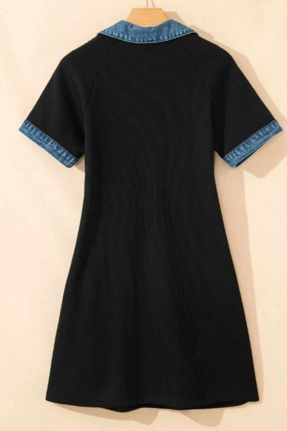 Black ribbed casual mini dress with short sleeves and a denim collar and cuffs.