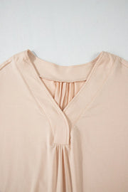 Dust Storm blouse with V-neck and gathered detail on the front.