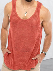 Open-knit scoop neck tank top in strawberry acrylic with a casual fit.