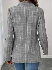 Light gray plaid blazer with buttoned cuffs and lapel collar.