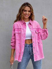 Fuchsia distressed denim shacket with frayed hem and cuffs, featuring button front and chest pockets.
