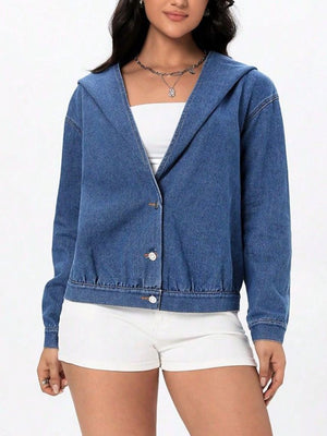Medium wash denim hooded bomber jacket with button front and elastic hem.