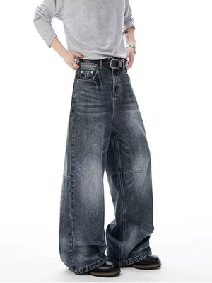 Men's dark wash denim wide-leg jeans with belt loops and a relaxed fit.