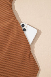 Caramel corduroy shirting jacket with gathered sleeves and a hidden phone pocket.