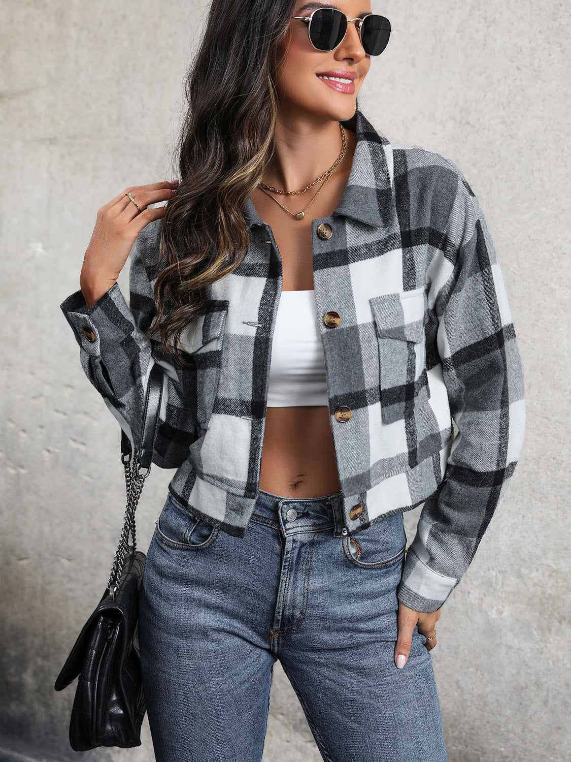 Checked plaid shacket in dark gray with patch pockets and button front.