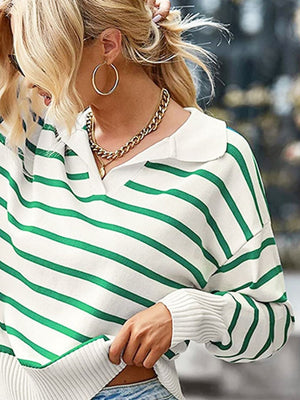 Striped polo knit sweater in white with green stripes, featuring a collar and ribbed cuffs.
