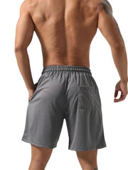 Gray mesh gym shorts with elastic waistband and back pocket.