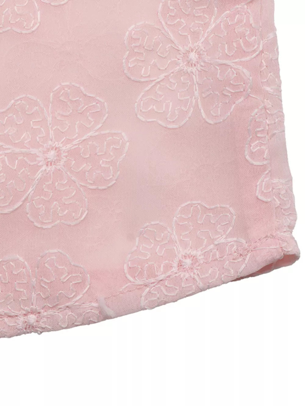 Pink embroidered floral blouse with pearl trim detail.
