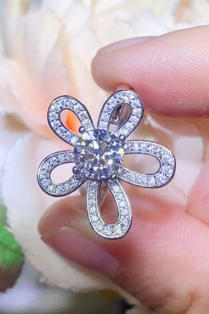 Pavé Petal Moissanite Ring in white, featuring a flower design with a central stone and sparkling accents.