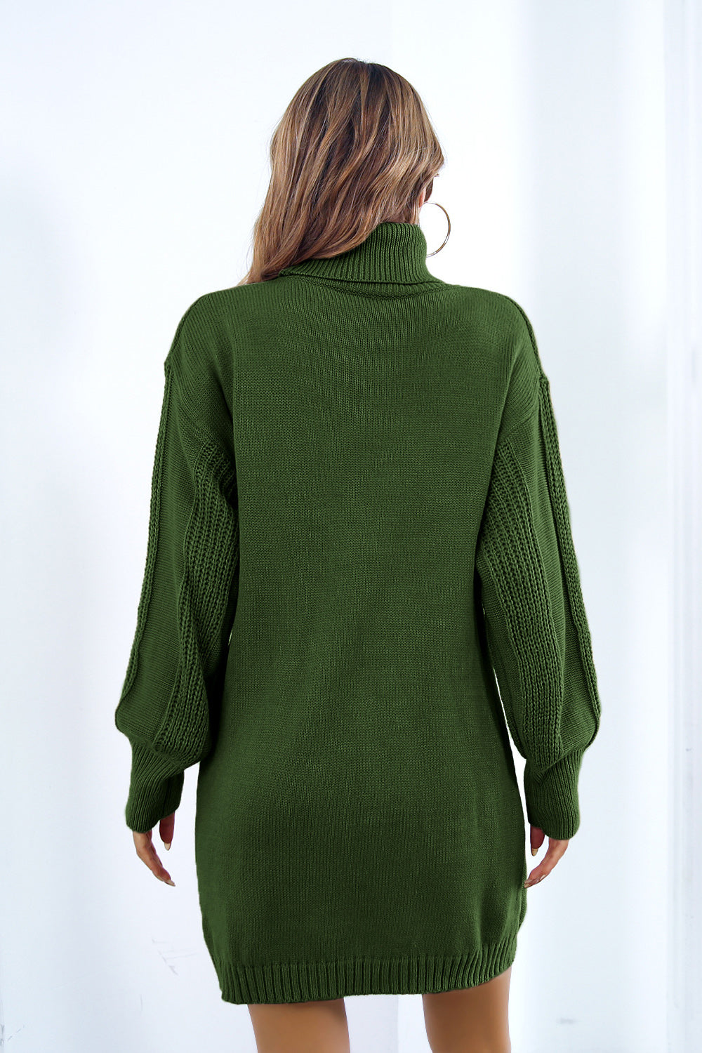 Green cable knit sweater dress with turtleneck and blouson sleeves