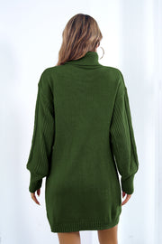 Green cable knit sweater dress with turtleneck and blouson sleeves