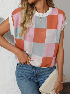 Checkerboard knit cap sleeve top in pink, orange, blue, and white.