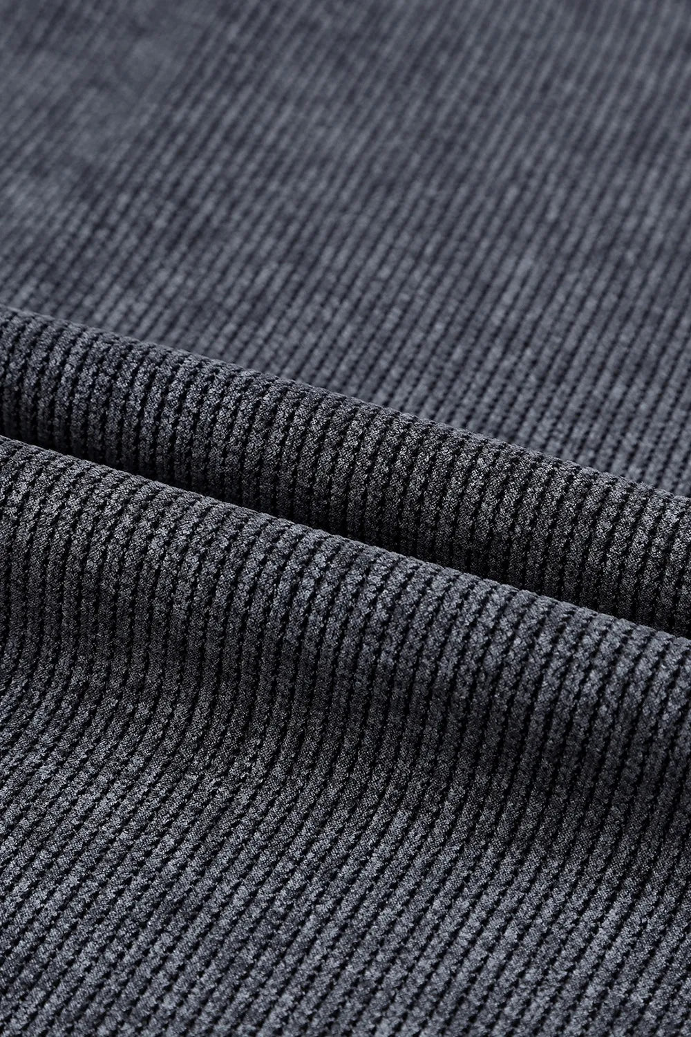 Dark gray ribbed sweatshirt fabric detail
