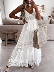 White crochet cami maxi dress with tiered lace and tassel details.