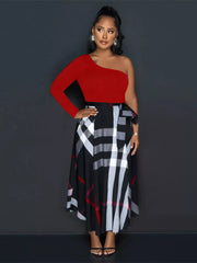 Red one-shoulder midi dress with a black plaid skirt and waist tie.