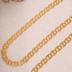Gold anchor link chain necklace with textured oval links