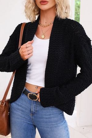 Black textured bouclé open-front jacket with a casual cut and acrylic material.