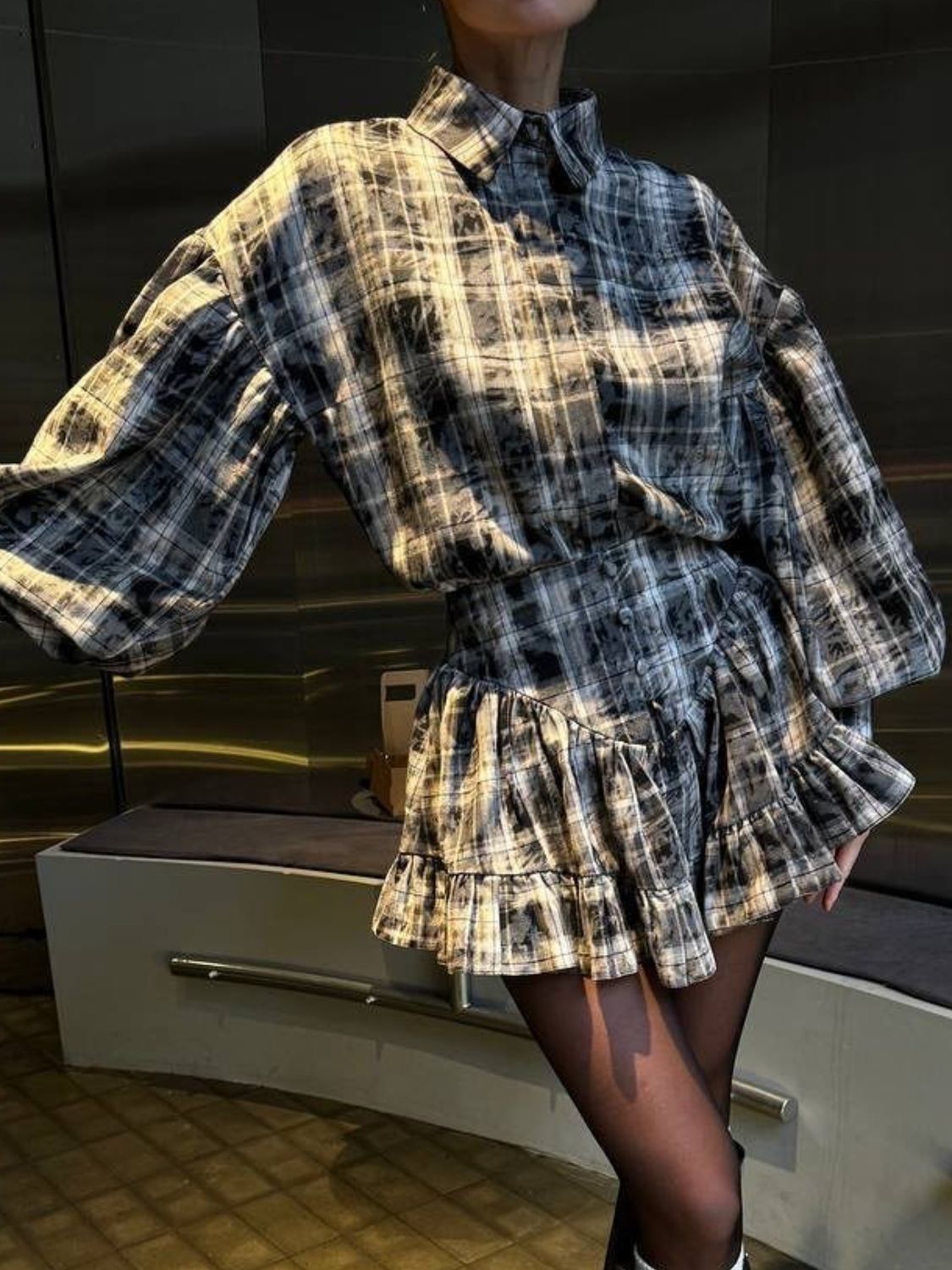 Plaid puff sleeve shirt and ruffled hem skirt set in dark gray.