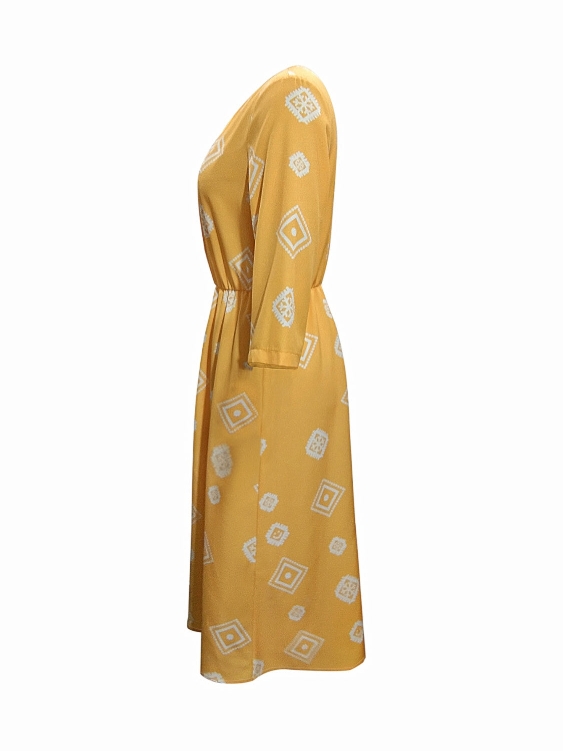 Yellow geometric print empire waist midi dress with 3/4 sleeves.