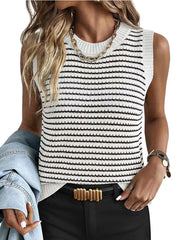 White and black striped knit sweater vest with crewneck and textured detail.