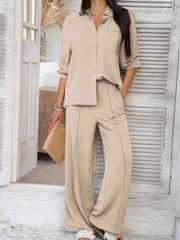 Textured resort shirt and wide leg pants set in tan, buttoned collared shirt with pocket, elastic waist pants.