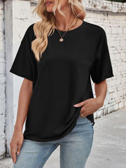 Black oversized cotton tee with seam details and crew neck.