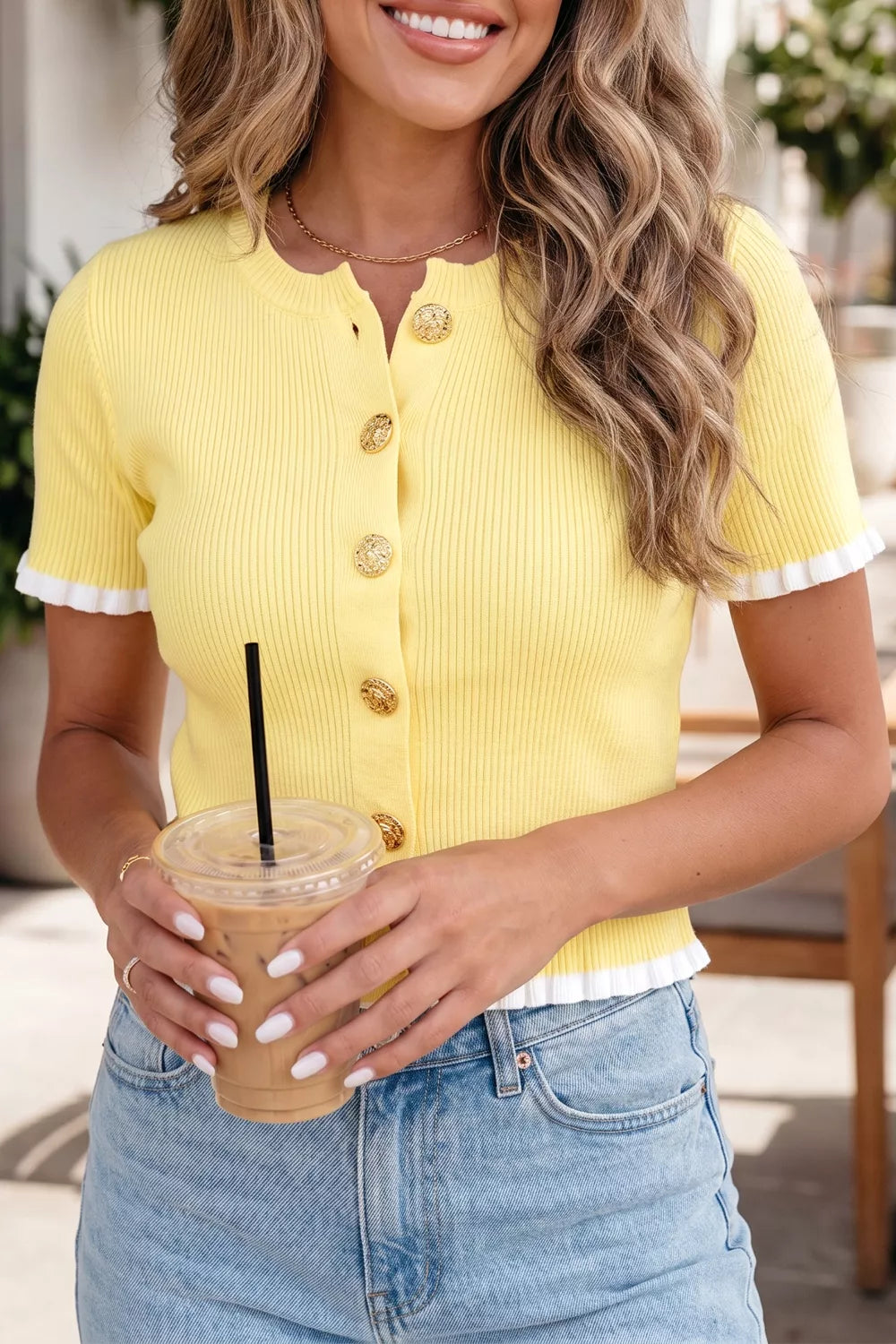Yellow ribbed short sleeve cardigan with frilled trim and gold buttons