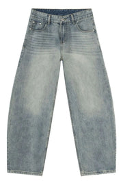 Faded light blue baggy denim jeans with a relaxed fit.