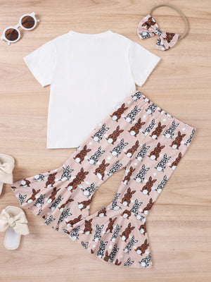 Girls' white t-shirt and pink bell-bottom pants with all-over bunny print.