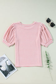 Textured stripe puff sleeve blouse in blush pink with a crew neck.