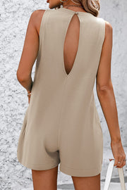 Tan romper with sleeveless design and keyhole back detail.