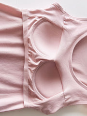 Pale Blush Built-In Support Tank Top with built-in bra cups and elastic band detail.
