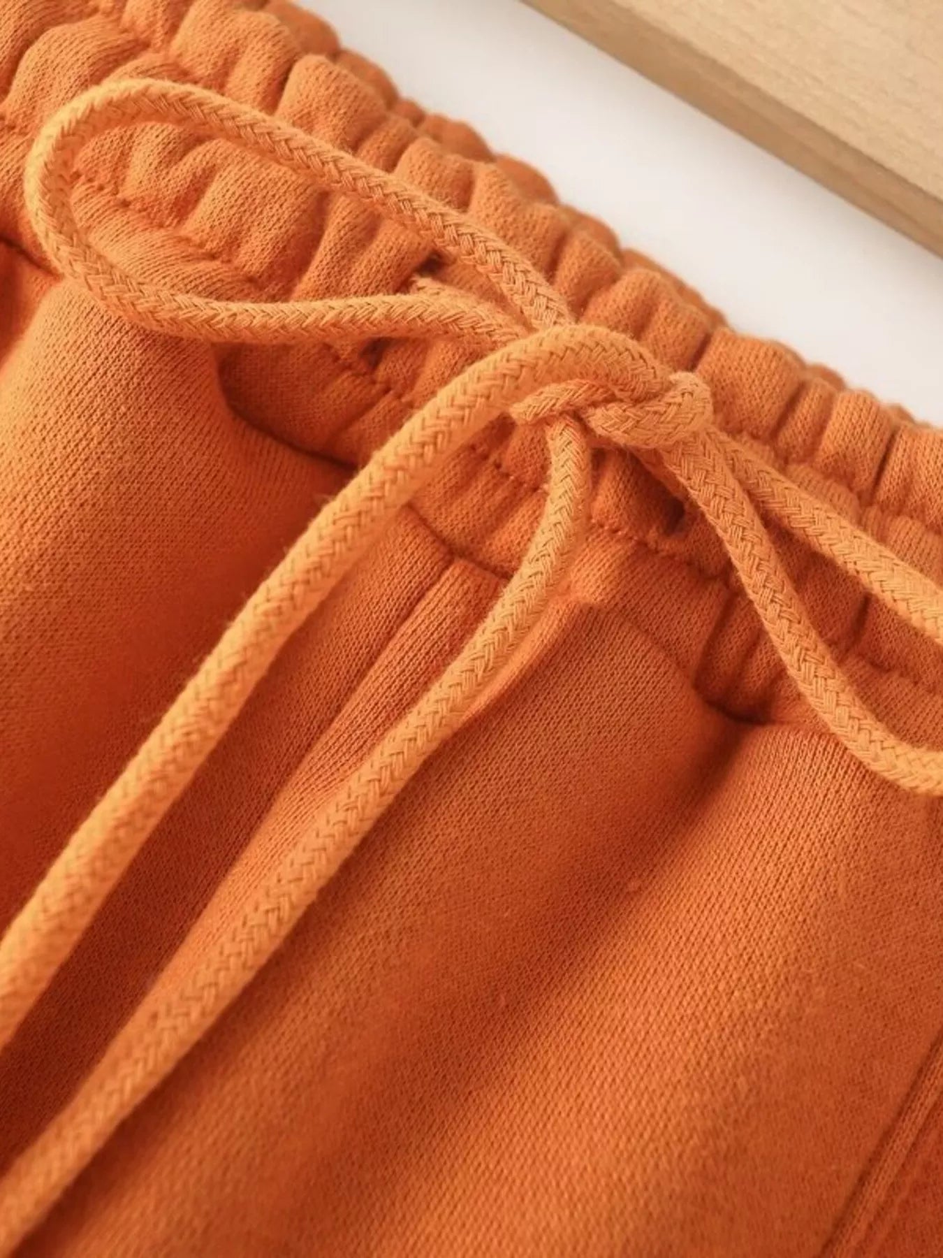 Orange casual wide-leg pants with drawstring waist detail