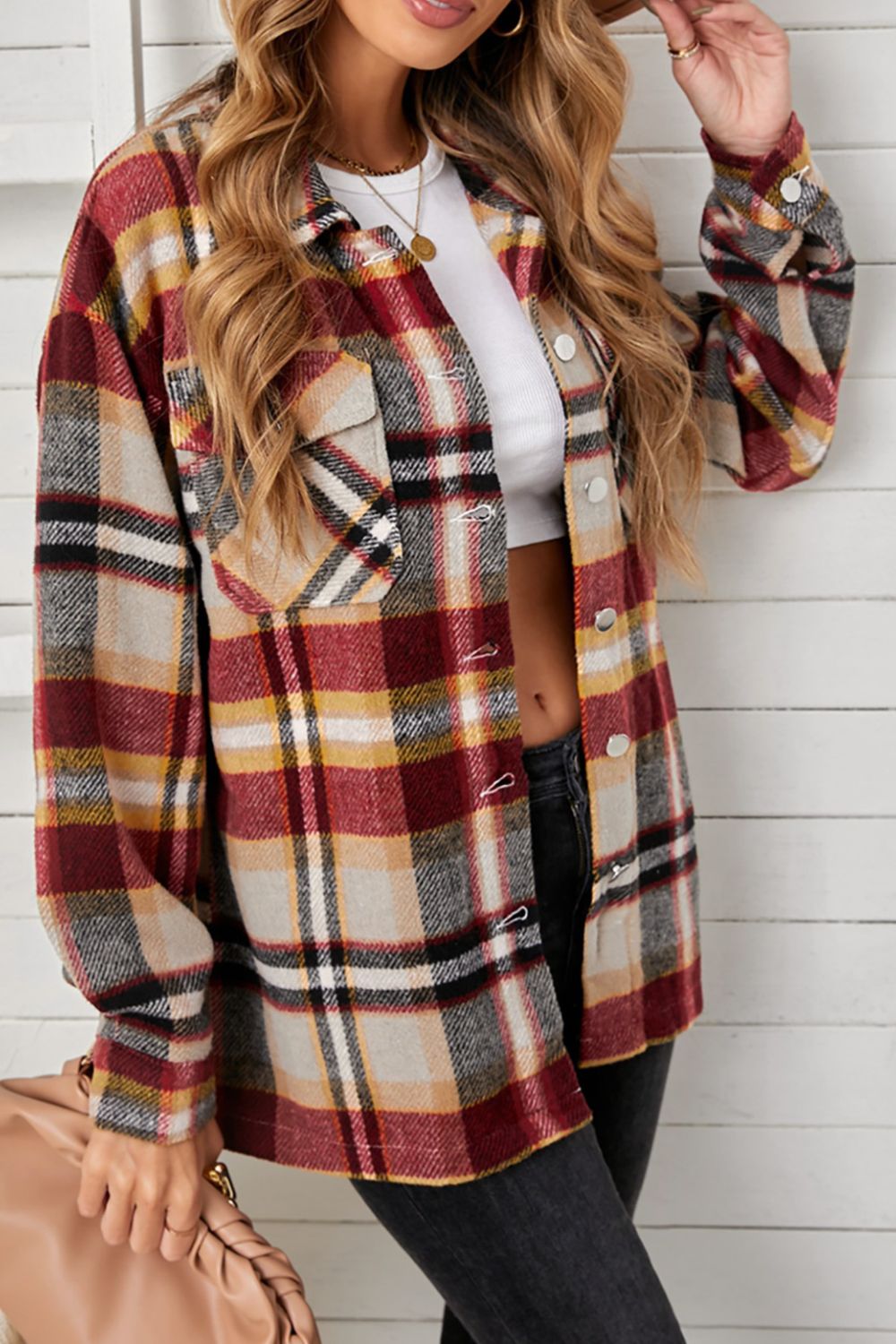 Relaxed plaid shacket with patch pockets in yellow/red, buttoned front, and collared neckline.