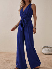 Indigo textured wrap-front sleeveless wide-leg jumpsuit with tie waist