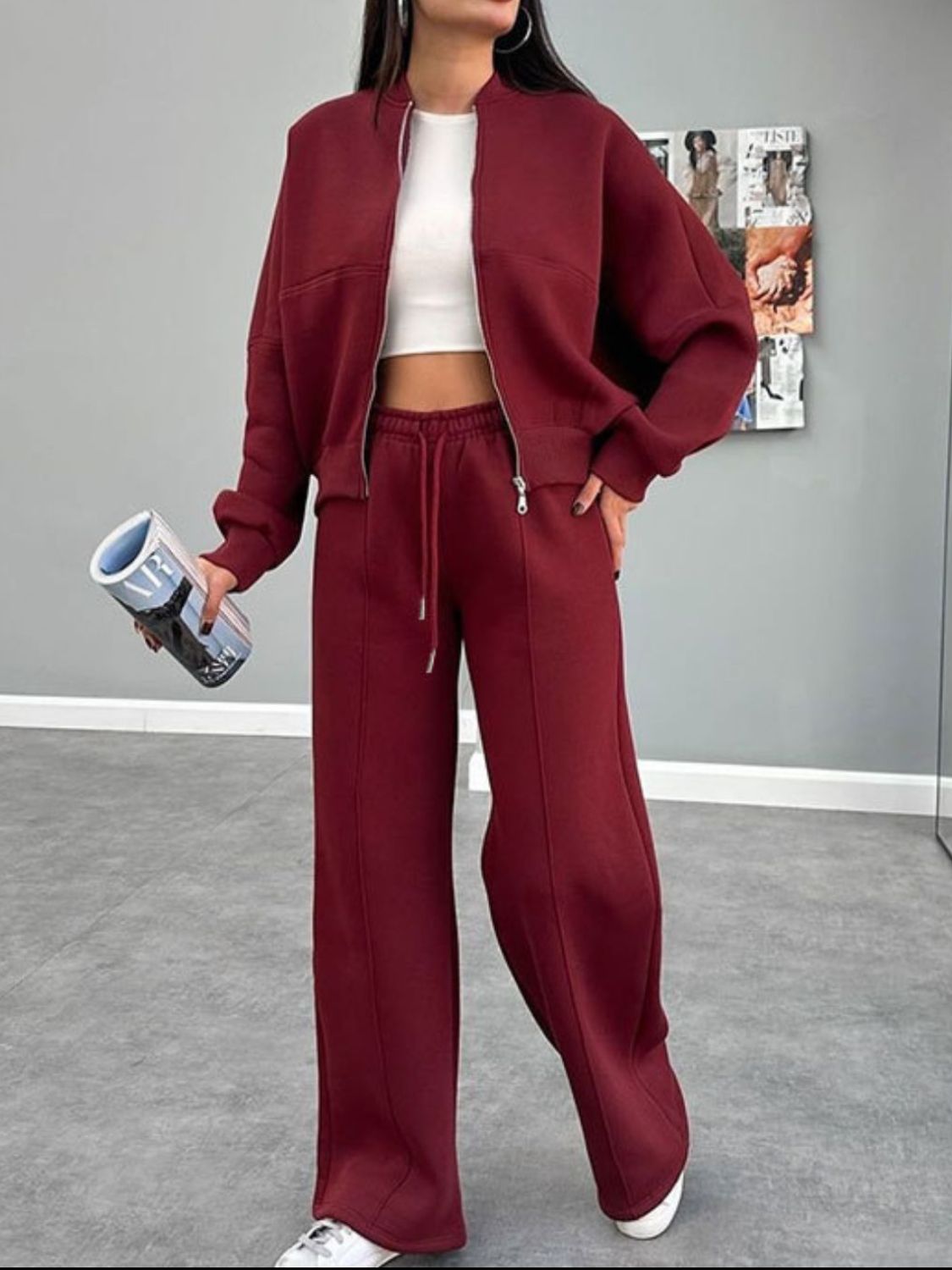 Burgundy zip-up bomber jacket and wide-leg sweatpants coord set with drawstring waist.